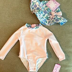 NWT Tommy Bahama baby long sleeve swimsuit and hat. Size 24 months.